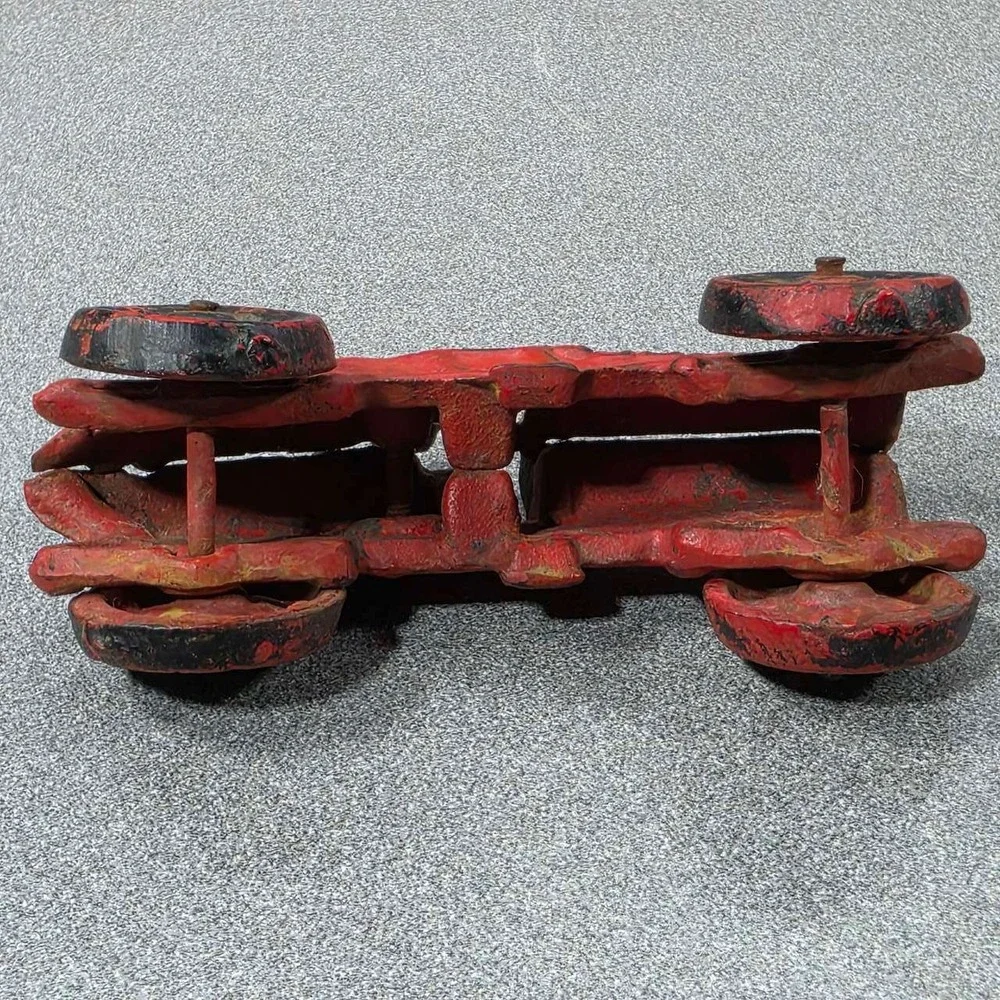 Antique Hubley Cast Iron Boat-tail Race Car Toy Driver 1920's.